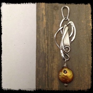 This pendant was in memory of a dear dog, Dasha.