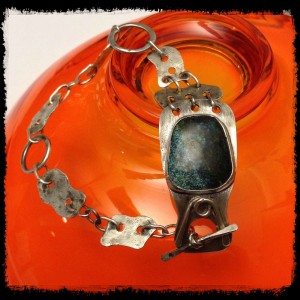 Turquoise and sterling silver bracelet - this is now a pendant.