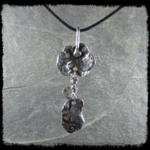 It would have been very difficult to stamp directly on this piece due to the shape.